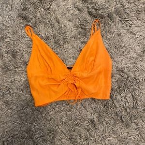 Orange crop top
